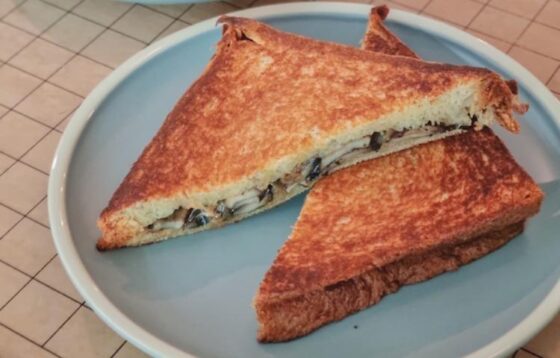 A plate of mushroom toast sandwich