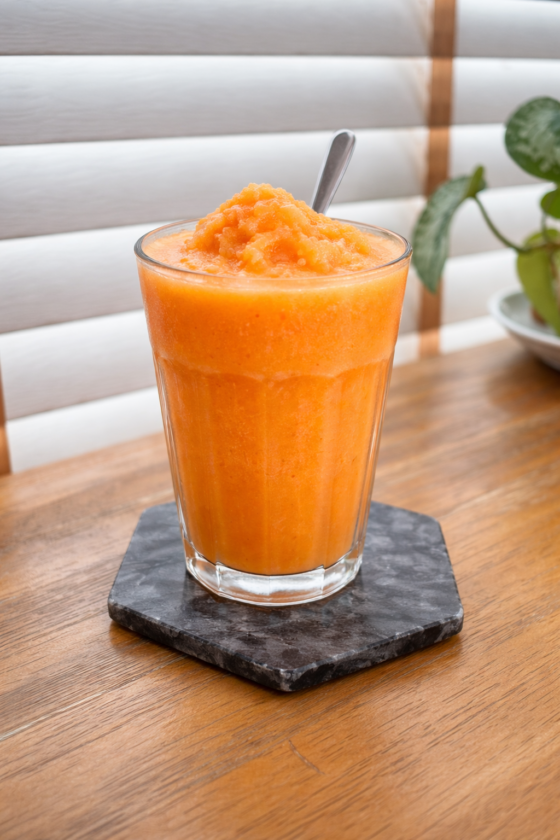 A glass of Piña Carrot-La